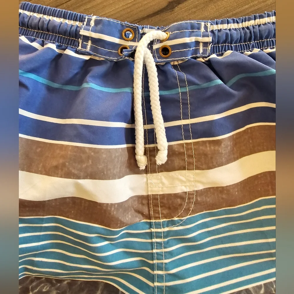 3T Quad Seven blue, gray and white swim trunks Vacation Spring Break beach shore
